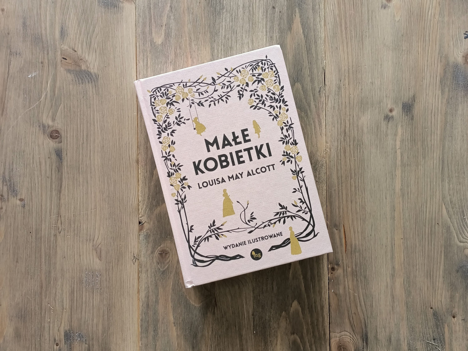 Okładka książki "Małe kobietki" Louisa May Alcott