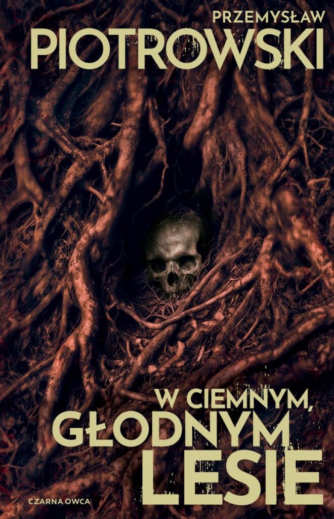 Okładka książki "W ciemnym, głodnym lesie" Przemysław Piotrowski